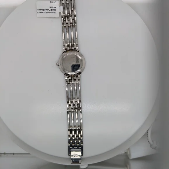 Designer Movado Esperanza Swiss Ladies 18K Gold Plated Stainless Steel Sapphire